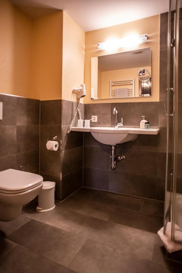 Hotel Garni Zur Alten Post Lembruch Esterno foto